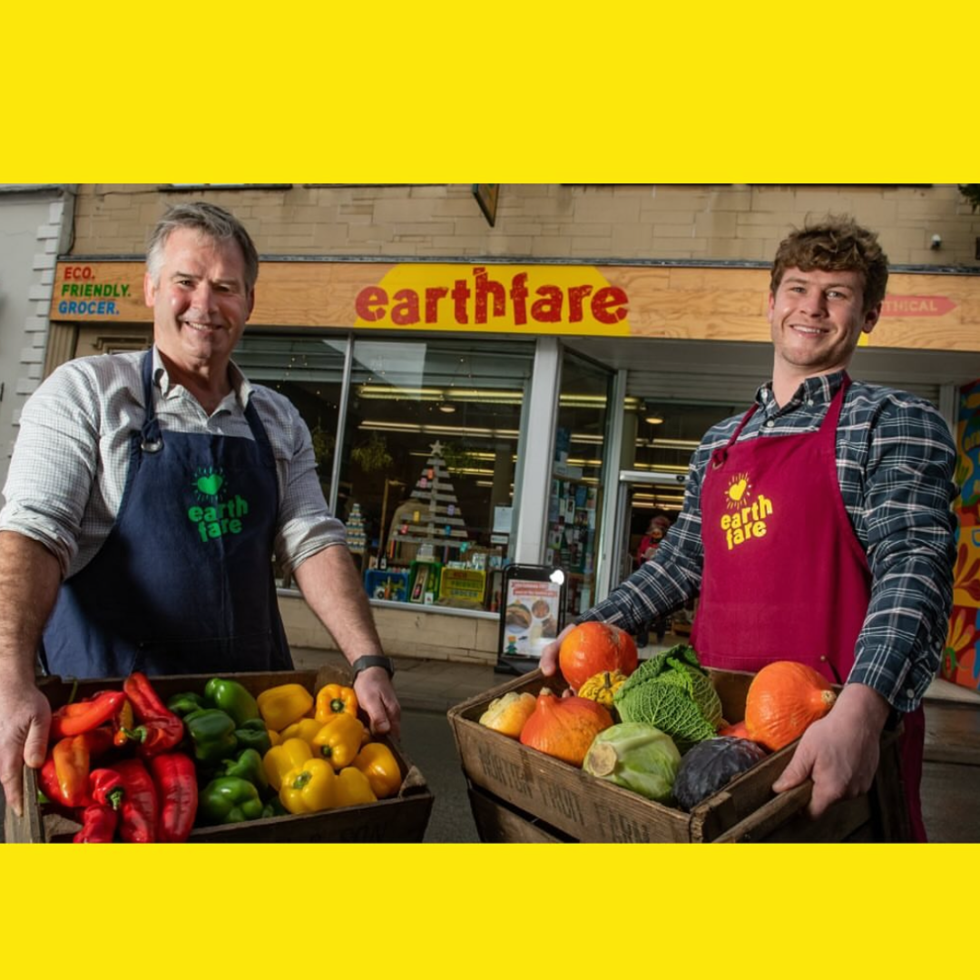 Henry and Andrew Outside Earthfare with Organic Fruit and Veg