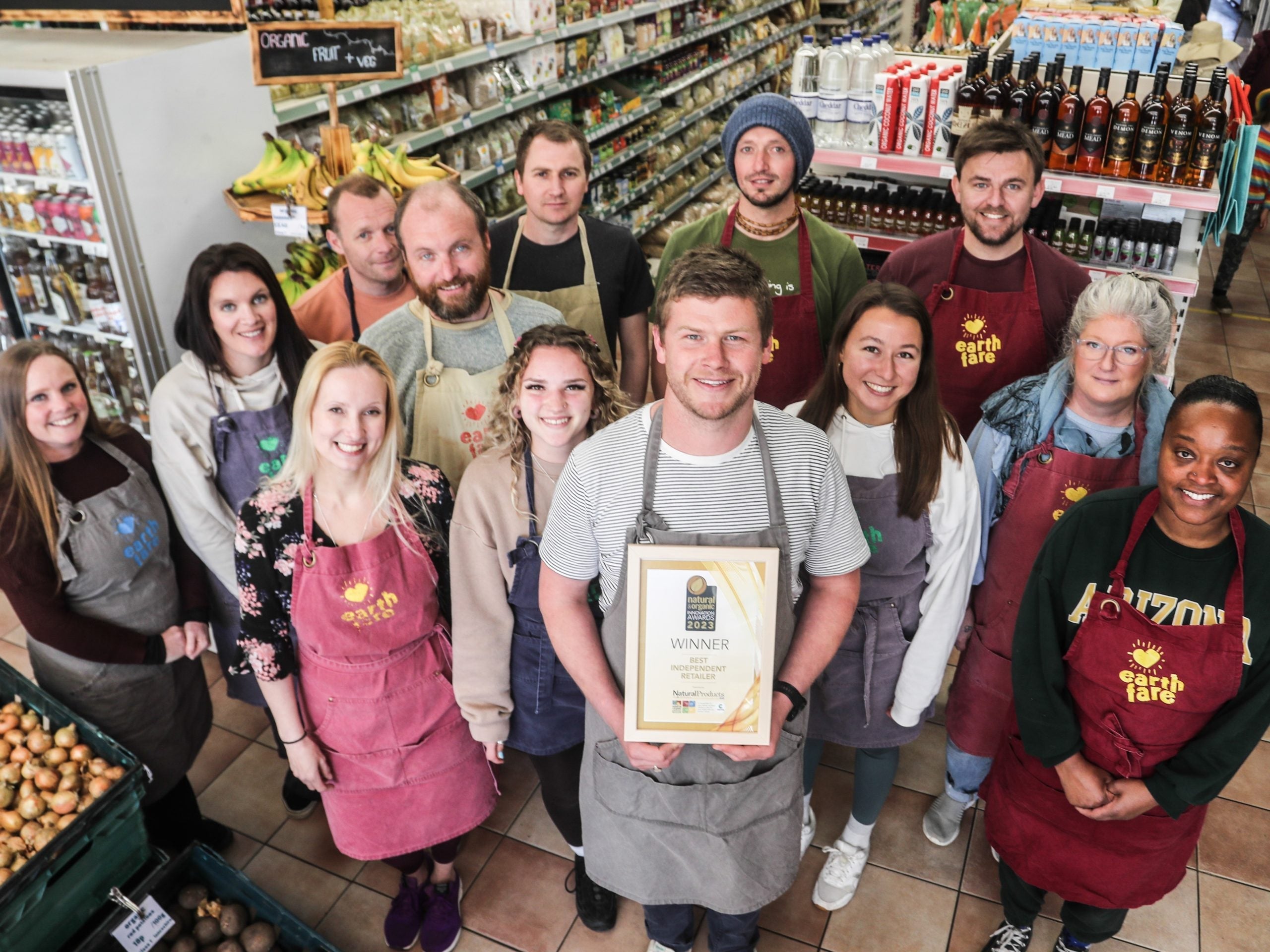 Earthfare Team holding award